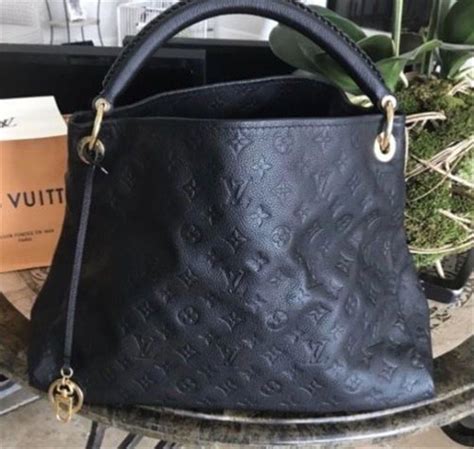 black and gold louis vuitton purse|louis vuitton all black purse.